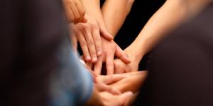 hands coming together