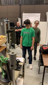 person being observed wearing a VR headset